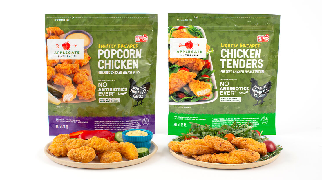 A bag of APPLEGATE NATURALS® Lightly Breaded Chicken Tenders and a bag of APPLEGATE NATURALS® Lightly Breaded Popcorn Chicken with two plates of chicken tenders and popcorn chicken in front of the bags sitting on a white background.